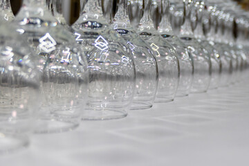 Empty wine glasses row elegant table setting banquet catering service wedding event professional...