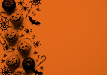Halloween background border with pumpkins, bats, spiders, candy corn and spider webs