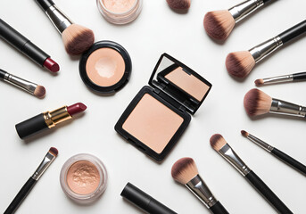 Elegant makeup essentials and brushes arranged professionally for beauty and fashion