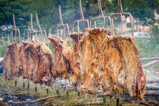 Traditional ground fire ribs, a typical and iconic gaucho barbecue prepared in a rustic, original, and unique way. Costela fogo de ch&atilde;o or costel&atilde;o