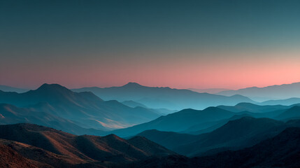 Obraz premium Mountains Stretch at Sunset: Dreamy, blue-toned landscape evokes peace. Ideal for web design, travel marketing, editorial.