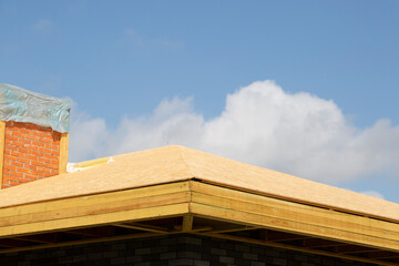Making a roof for a modern house. Wooden roof frame.