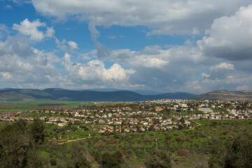 Spring landscape in a green valley among the mountains
