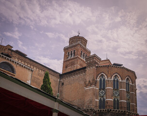 Fototapeta premium Historic brick basilica in Venice with tower