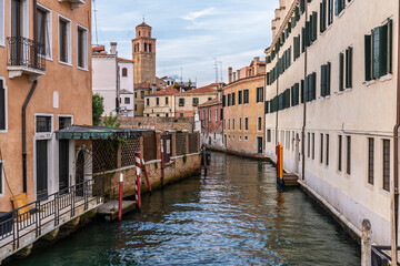 Venetian canals with historic palaces and facades