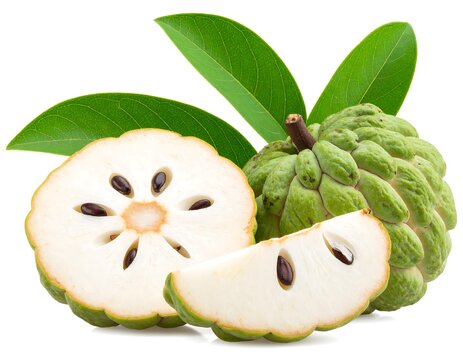 Close-up of cut and whole cherimoya fruit with leaves