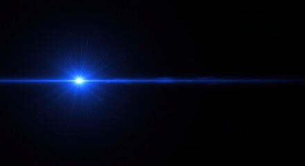 Obraz premium Electric Blue Beam of Light: A solitary, yet powerful, electric blue beam of light stretches across a stark, black expanse, illuminating the darkness with an ethereal, mesmerizing glow.
