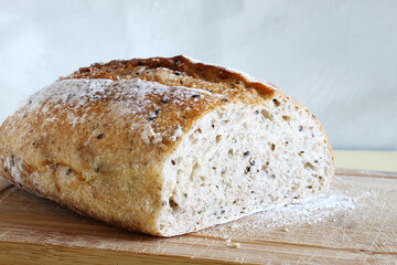 Artisan bread on the cutting board. Brazilian breakfast.