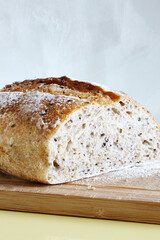 Artisan bread on the wooden board for brazilian breakfast.