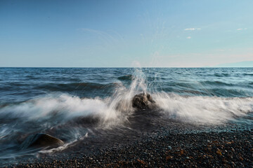 waves crashing on rocks