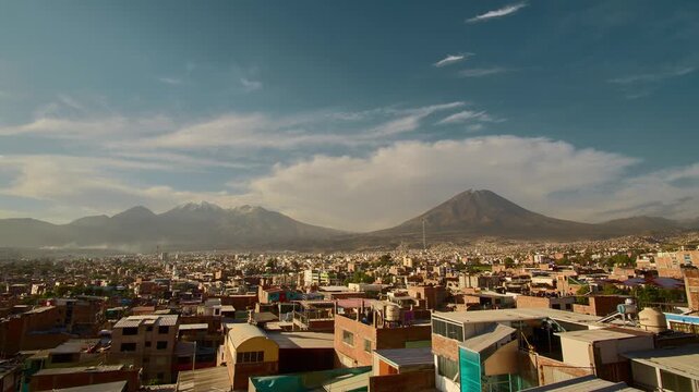 View of the Chachani and Misti volcanoes in the city of Arequipa, from sunset to nightfall.