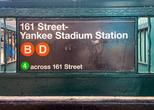 Bronx, NY - US - Aug 16, 2025 A close-up of the iconic 161 Street-Yankee Stadium Station sign in the New York City Subway, displaying the B, D, and 4 train lines.