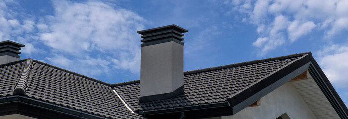 Composite roof tile with chimney