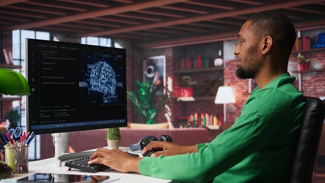 African american engineer coding a neural network AI brain model for machine learning and deep learning, solving IT support tasks on pc. Debugging software and checking for errors. Camera B.