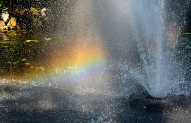 tęcza na kroplach wody z fontanny, tęcza na fontannie, a rainbow on the drops of water from the fountain, Rainbow in the fountain © kateej
