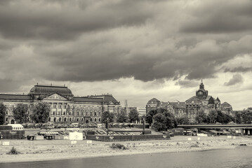 Dresden, Germany - July 15, 2016: Beautiful riverfront architecture of Dresden city with Elbe River and historic monuments