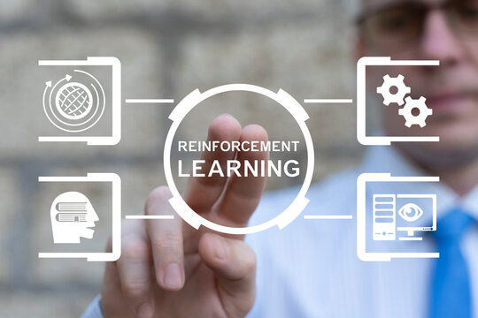 Business person holding blocks with icons sees the inscription: REINFORCEMENT LEARNING. Reinforcement Learning LLM Artificial Intelligence Agent Dynamic Environment Technology concept.