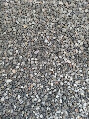 Fine Grey Gravel Texture: Ideal background for construction, landscaping, or minimalist design. Durable, natural stone for paths, gardens, and drainage. Build your foundation.