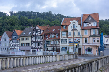 Colorful traditional German half timbered houses with red roofs along street