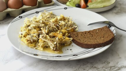 Scrambled eggs with fried bean sprouts.