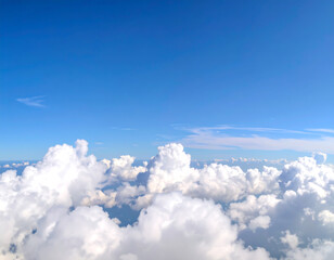 Aerial View: Serene Cumulus Cloudscape, Bright Blue Sky, Peaceful and Tranquil High-Altitude Panorama.