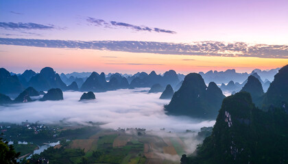 Serene Sunrise over Karst Mountains and Misty Valley: Breathtaking Panoramic Landscape Photography of Rural China.