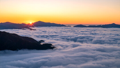 Serene sunrise over mountainous landscape, breathtaking view above a sea of clouds, peaceful dawn, majestic scenery.