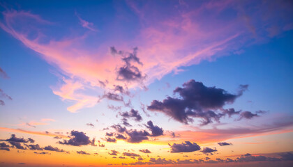 Vibrant Sunset Sky: Dramatic Pink, Orange, and Purple Hues with Scattered Clouds, Serene and Peaceful Evening Atmosphere.