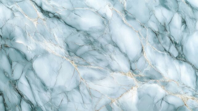 Smooth marble surface with subtle light blue and white tones featuring natural veins and intricate cracks creating an elegant and calming effect
