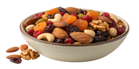 A bowl filled with a delicious mix of dried fruits and nuts isolated on transparent background
