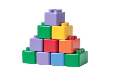 Colorful plastic building blocks stacked in pyramid shape featuring green purple yellow red orange and blue pieces evoking playful and creative mood for children activities