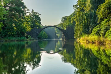 Acrylglasbilder Rakotzbrücke Rakotz Bridge (Rakotzbrucke, Devil's Bridge) with reflection of the bridge in the water create a full circle. Kromlau, Saxony, Germany  © Pawel Pajor