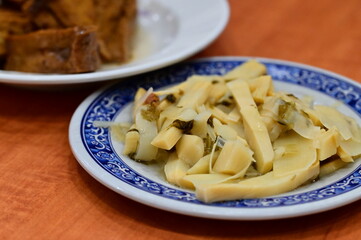 Traditional dried bamboo shoots, preserved food common in Taiwanese and Hakka cuisine. Fermented and sun-dried bamboo prepared as flavorful side dish.