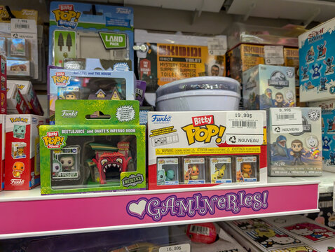 Quebec, Canada, 07 July 2025 : Colorful collectible Funko Pop toys displayed on shelves in store aisle