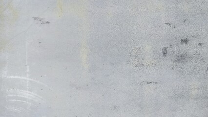 Background of an iron wall with faded gray paint because it is old and rusty. Blurred gray rusty grunge metal texture with Instagram style filter. Vintage effect.