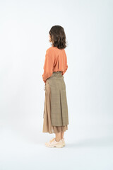 Full-body photo of a woman from behind