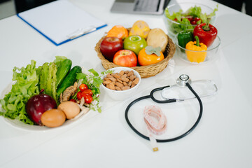 Fresh vegetables, fruits, and healthy food concepts combined with medical nutrition care, wellness, and diet planning