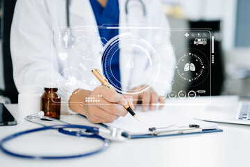 Doctor using digital tablet with holographic health icons. Concept of smart healthcare, data technology, innovation