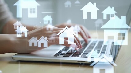 Close up of Hands Typing on Laptop with House Icons Overlaid for Online Real Estate Search on Light Wood Tabletop and Blurred Gray Background