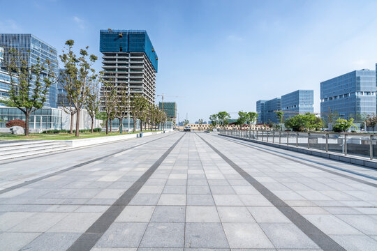 Empty road with modern buildings