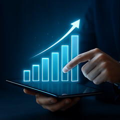 Modern financial growth chart on a tablet shows rising profits and business investment success
