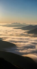Ethereal Mountain Peaks Emerging from a Luminous Sea of Clouds at Sunrise