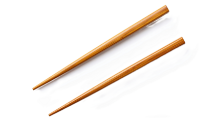 A pair of light brown wooden chopsticks are artfully presented against a dramatic backdrop of white paint strokes, creating a dynamic visual.