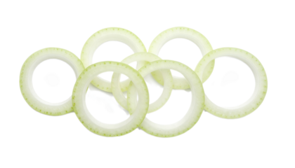 Stacked onion rings, pale yellow-green, arranged against a black background, create a visually appealing food image.