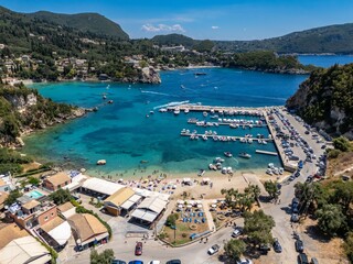Fototapeta premium Aerial view of a scenic coastal landscape in Paleokastritsa, Corfu, Greece and the Ionian Sea.