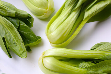 Obraz premium Fresh bok choy on white background.