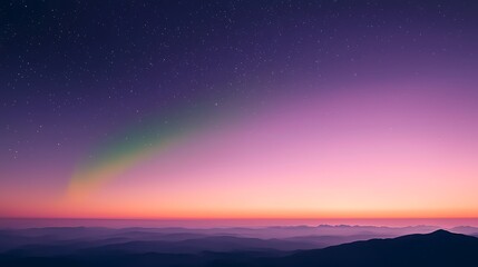 Fototapeta premium Vibrant rainbow graces a purple and pink sunset sky over mountains