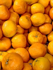 Vibrant Oranges Pile High, Fresh Citrus Fruit Background.
