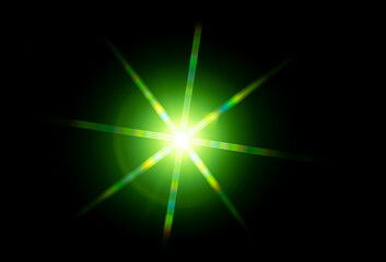 green flashy spotlight star made with optical star filter on camera
