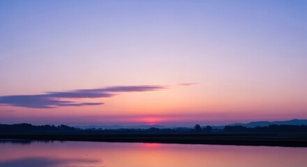 Serene Twilight Horizon with Pastel Sky and Reflective Water